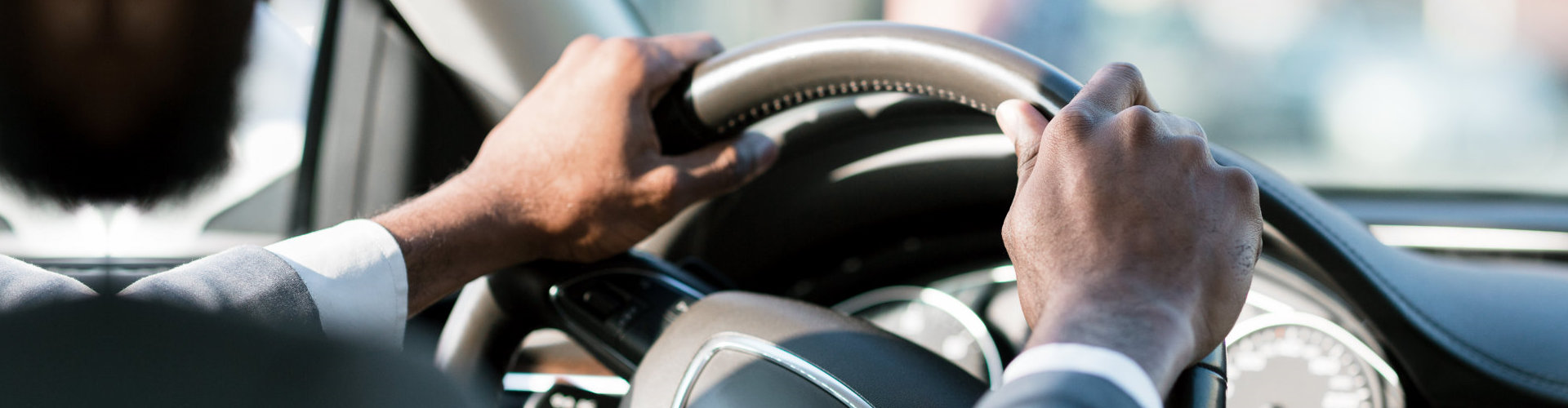 hands on the steering wheel